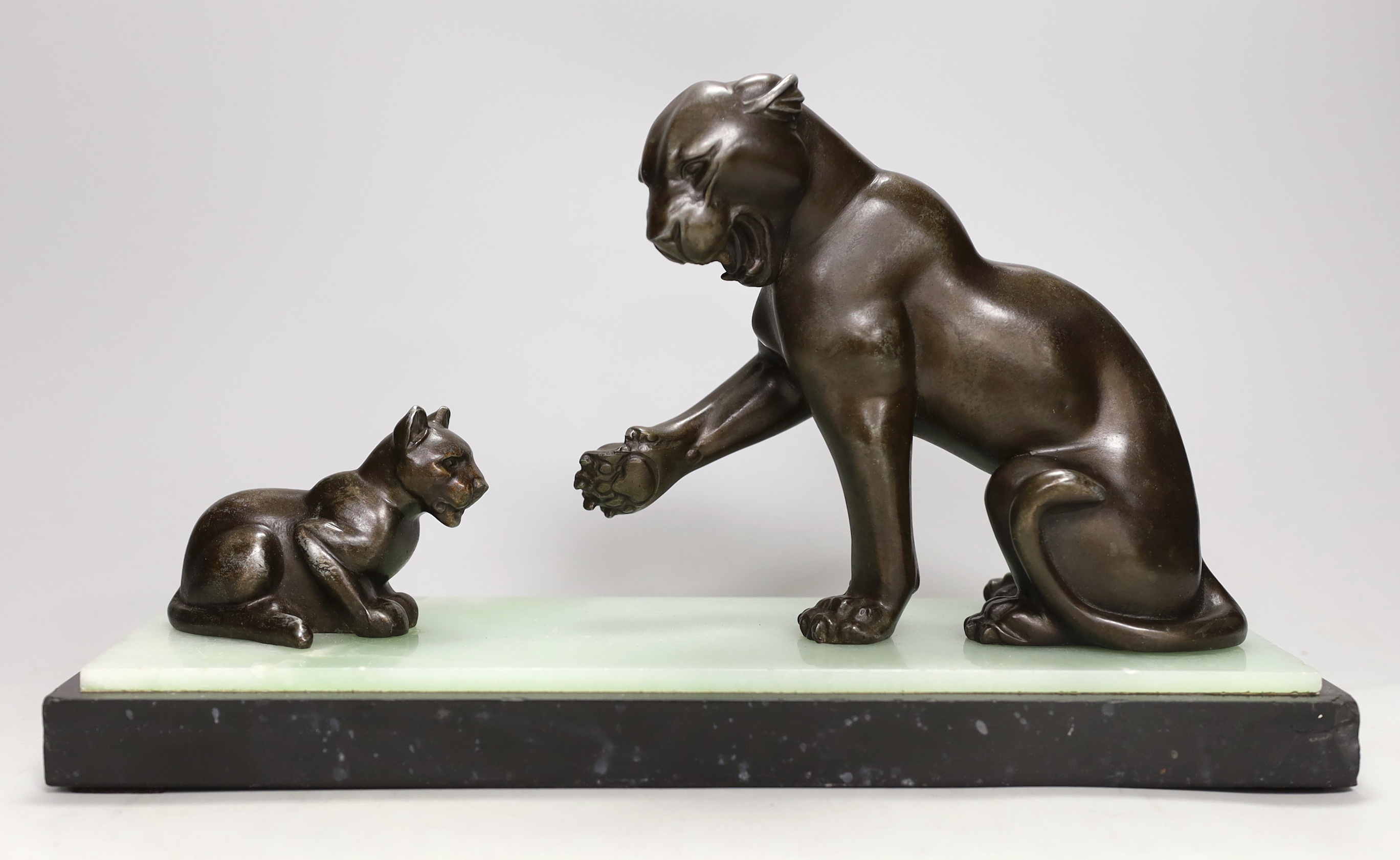 Irénée Rochard (French, 1906 - 1984). An Art Deco bronzed spelter ‘panther and cub’ group, on onyx and marble base, 37cm long